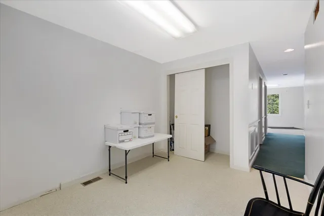 a view of a livingroom with furniture