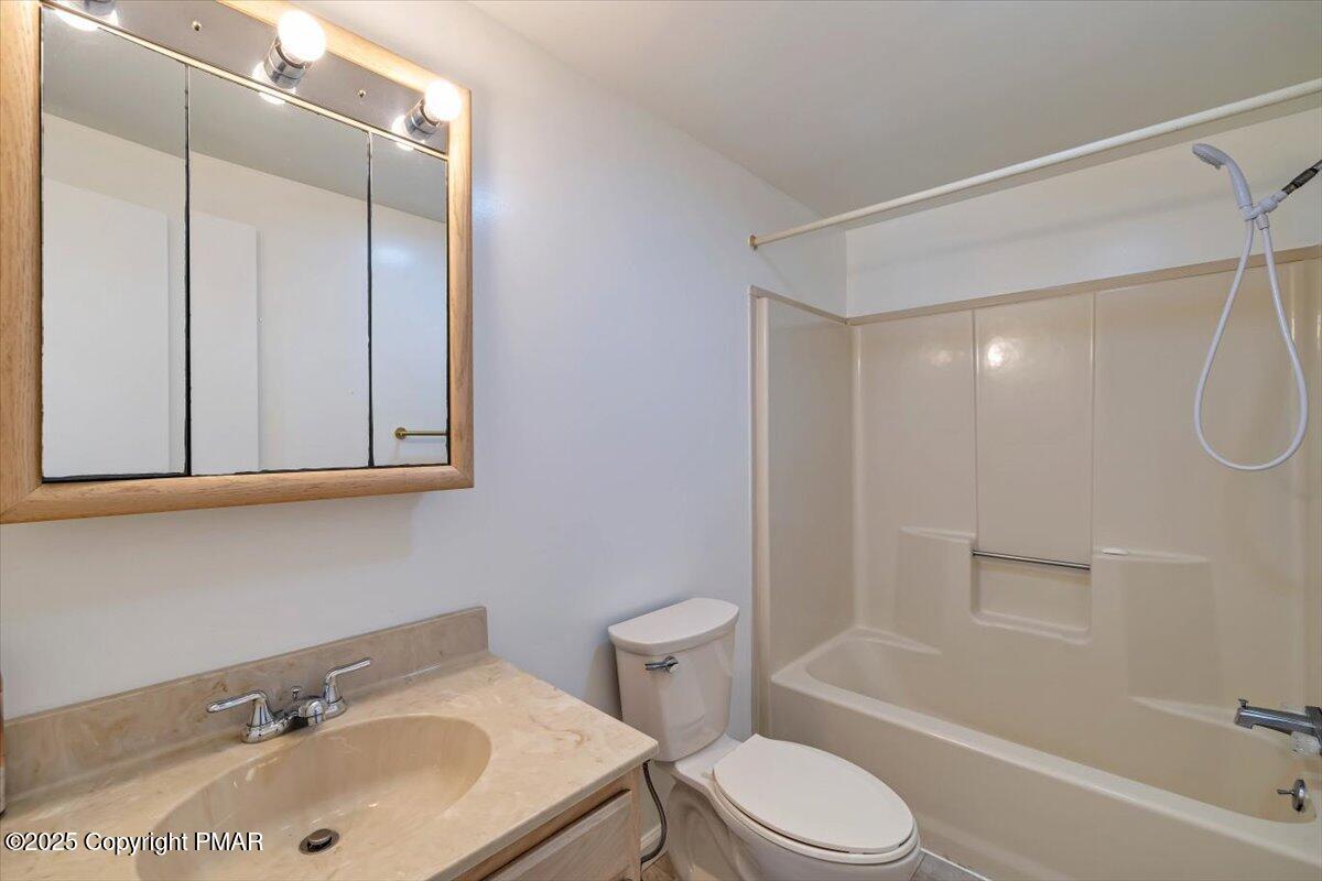 115 Daisy Drive Effort, PA 18330 - Photo 12 of 15 a bathroom with a sink toilet and shower