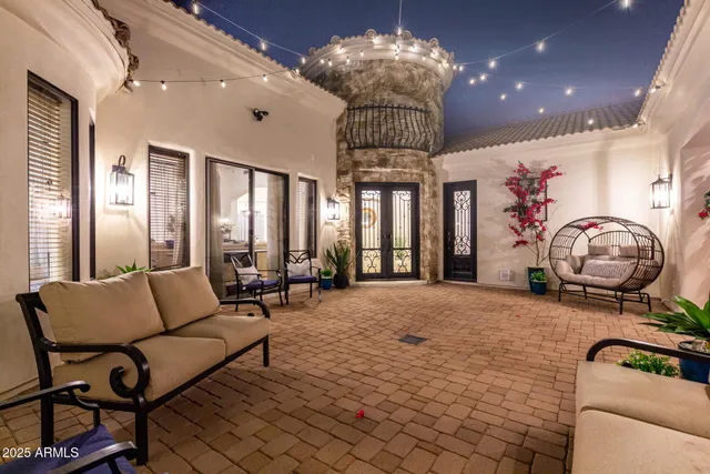 a bathroom with a granite countertop sink a mirror and a shower