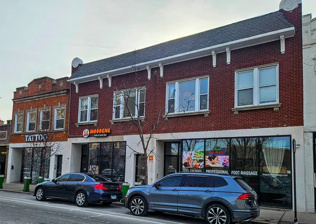 a car parked in front of a building