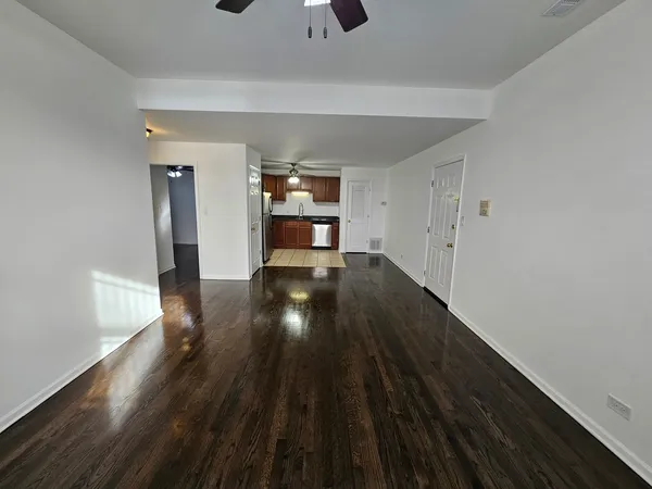 a view of a livingroom with wooden floor
