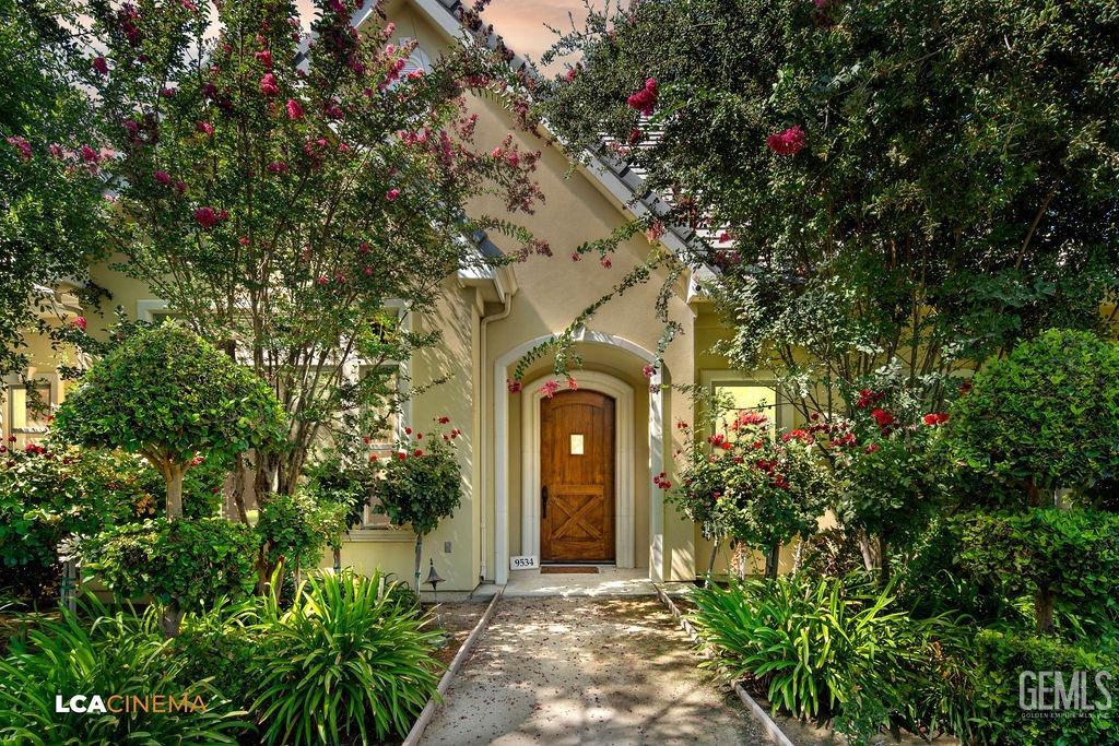 Undisclosed Address Bakersfield, CA 93314 - Photo 1 of 75 a front view of a house with a garden
