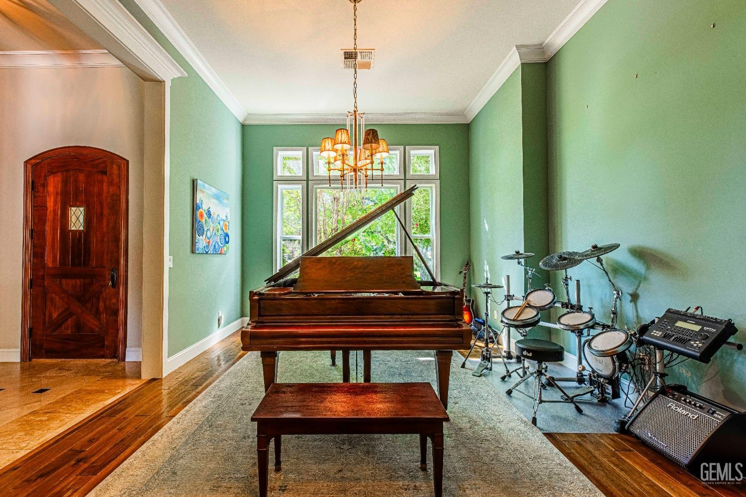 Undisclosed Address Bakersfield, CA 93314 - Photo 16 of 75 a living room with furniture a piano and a window