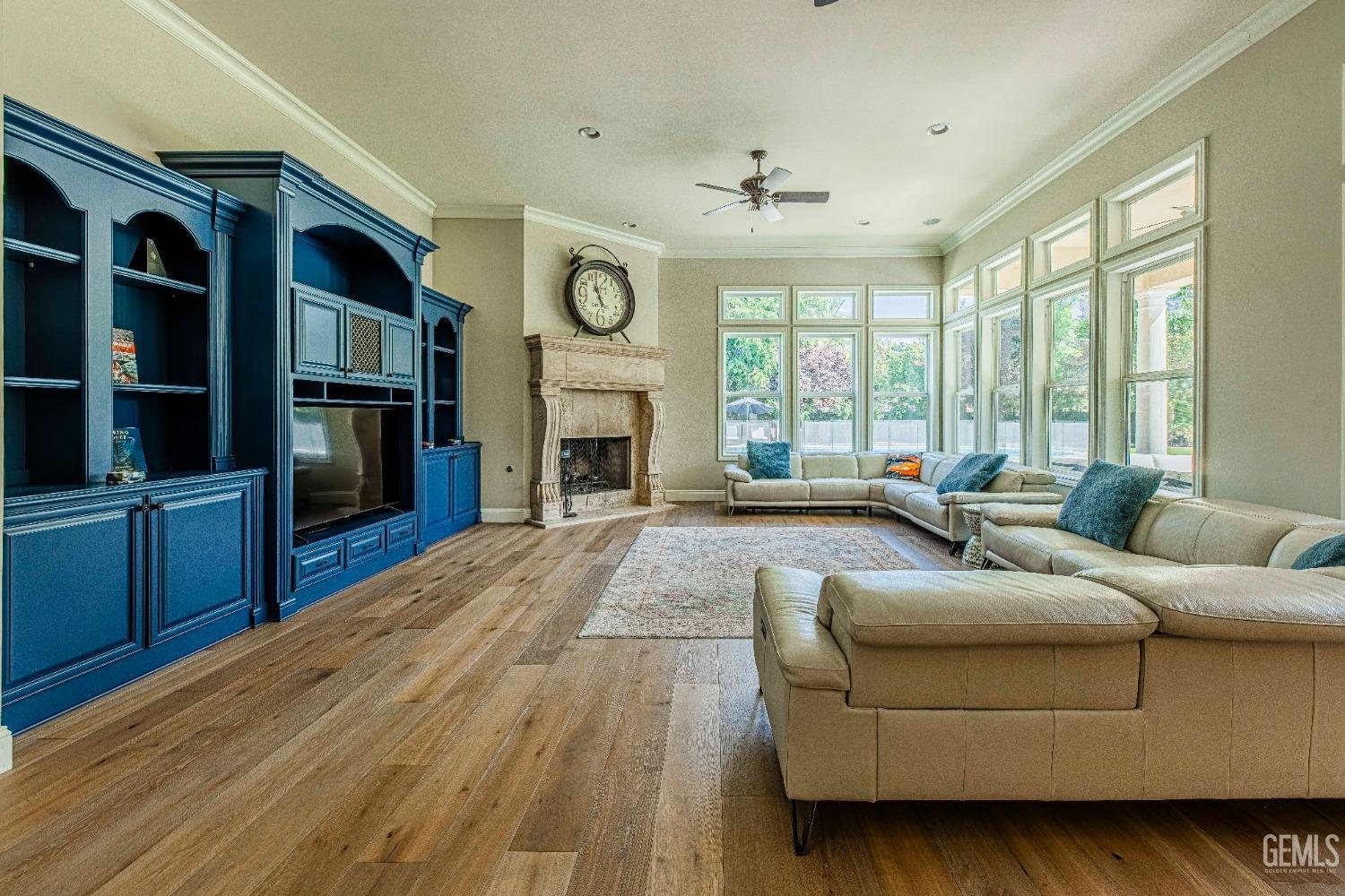 Undisclosed Address Bakersfield, CA 93314 - Photo 19 of 75 a living room with furniture fireplace and flat screen tv