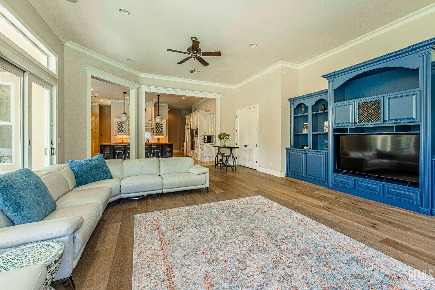 Undisclosed Address Bakersfield, CA 93314 - Photo 21 of 75 a living room with furniture and a flat screen tv