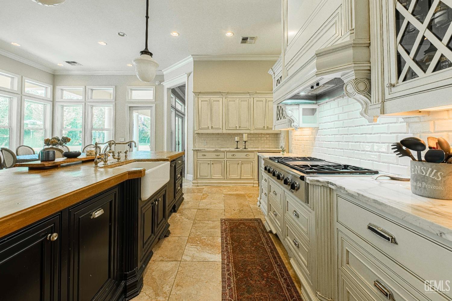 Undisclosed Address Bakersfield, CA 93314 - Photo 24 of 75 a kitchen with stainless steel appliances granite countertop a sink and a stove