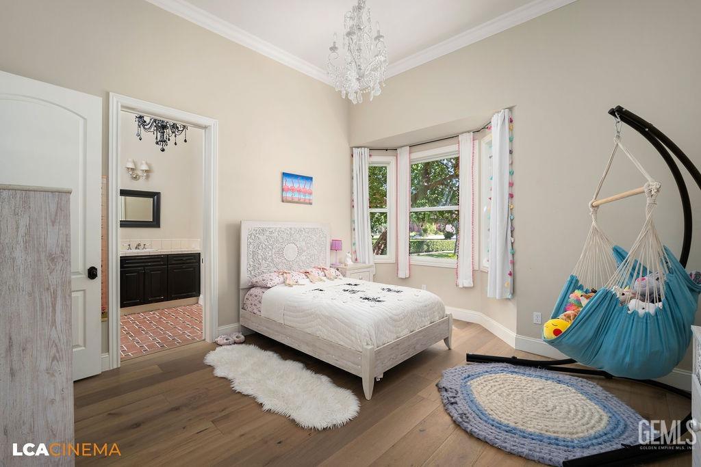 Undisclosed Address Bakersfield, CA 93314 - Photo 33 of 75 a bedroom with a bed a couch and a window