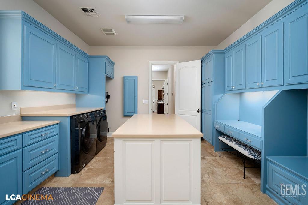 Undisclosed Address Bakersfield, CA 93314 - Photo 38 of 75 a kitchen that has a sink and a stove in it