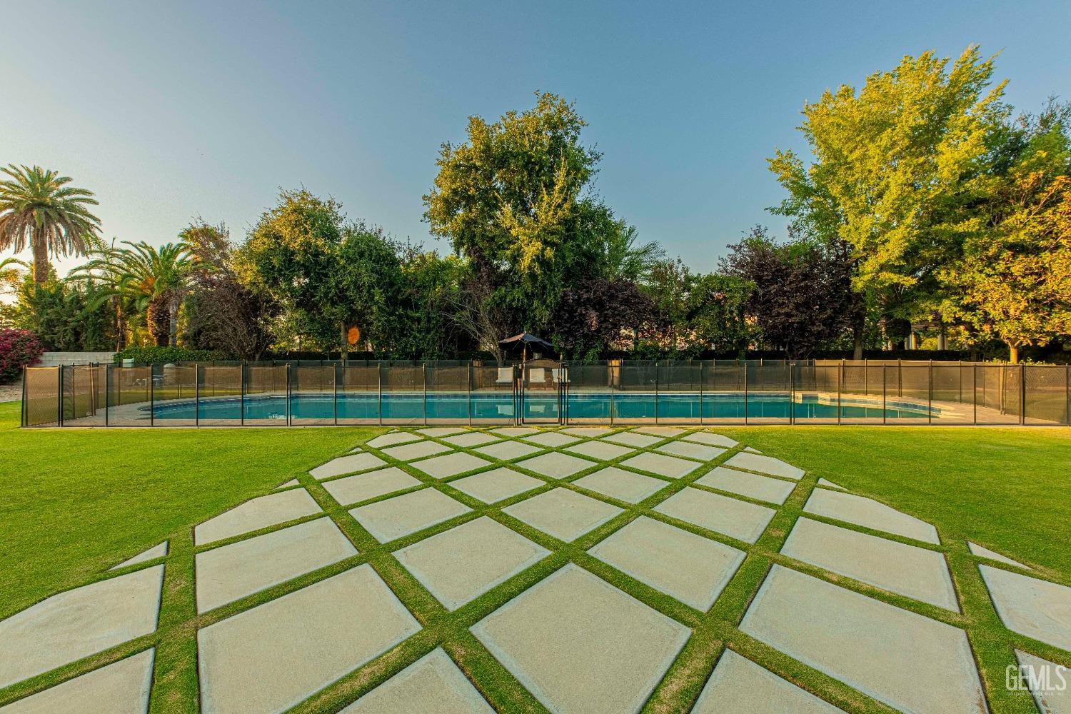 Undisclosed Address Bakersfield, CA 93314 - Photo 4 of 75 a view of a tennis court