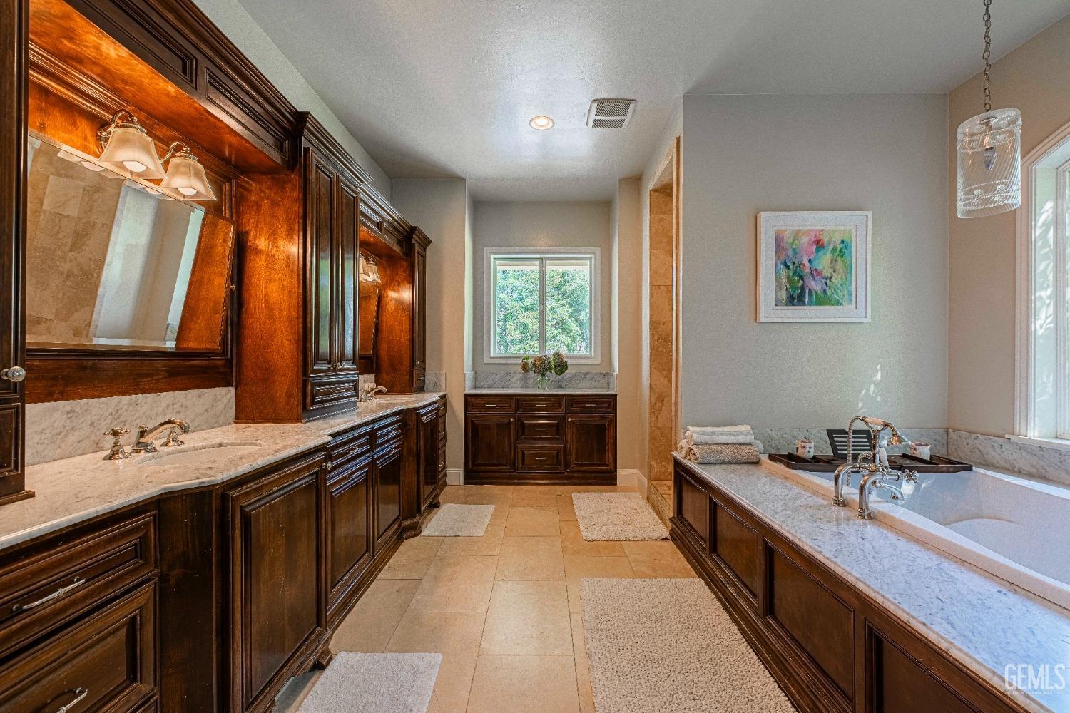 Undisclosed Address Bakersfield, CA 93314 - Photo 43 of 75 a large kitchen with a large window