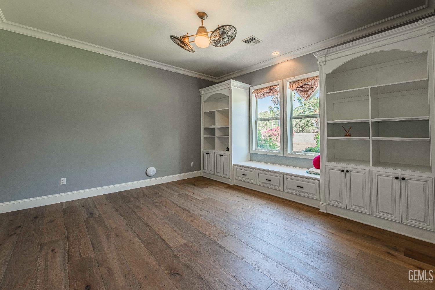 Undisclosed Address Bakersfield, CA 93314 - Photo 49 of 75 wooden floor in an empty room with a window