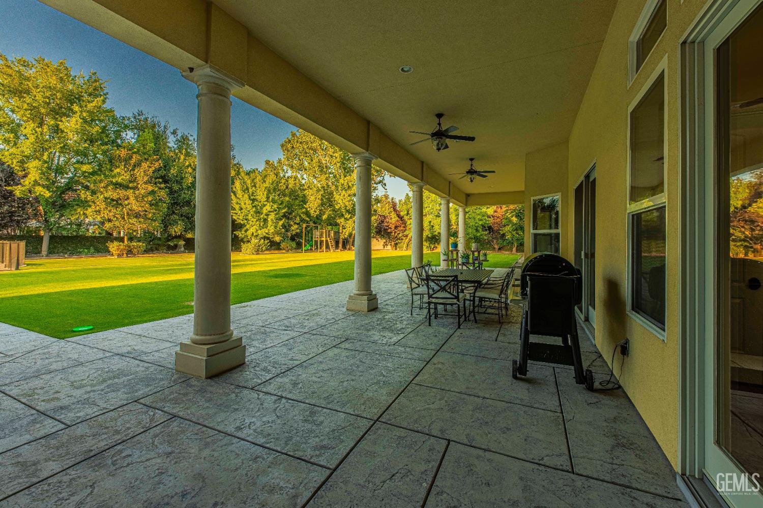 Undisclosed Address Bakersfield, CA 93314 - Photo 53 of 75 a view of a porch with chairs and backyard