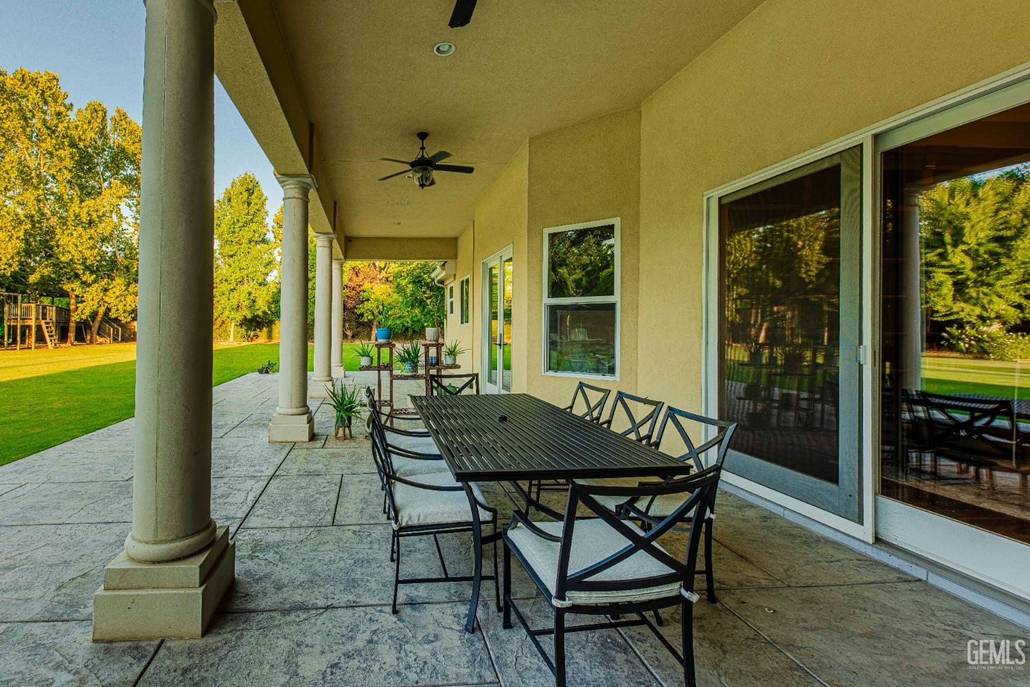 Undisclosed Address Bakersfield, CA 93314 - Photo 54 of 75 a view of an outdoor dining space with a table and chairs
