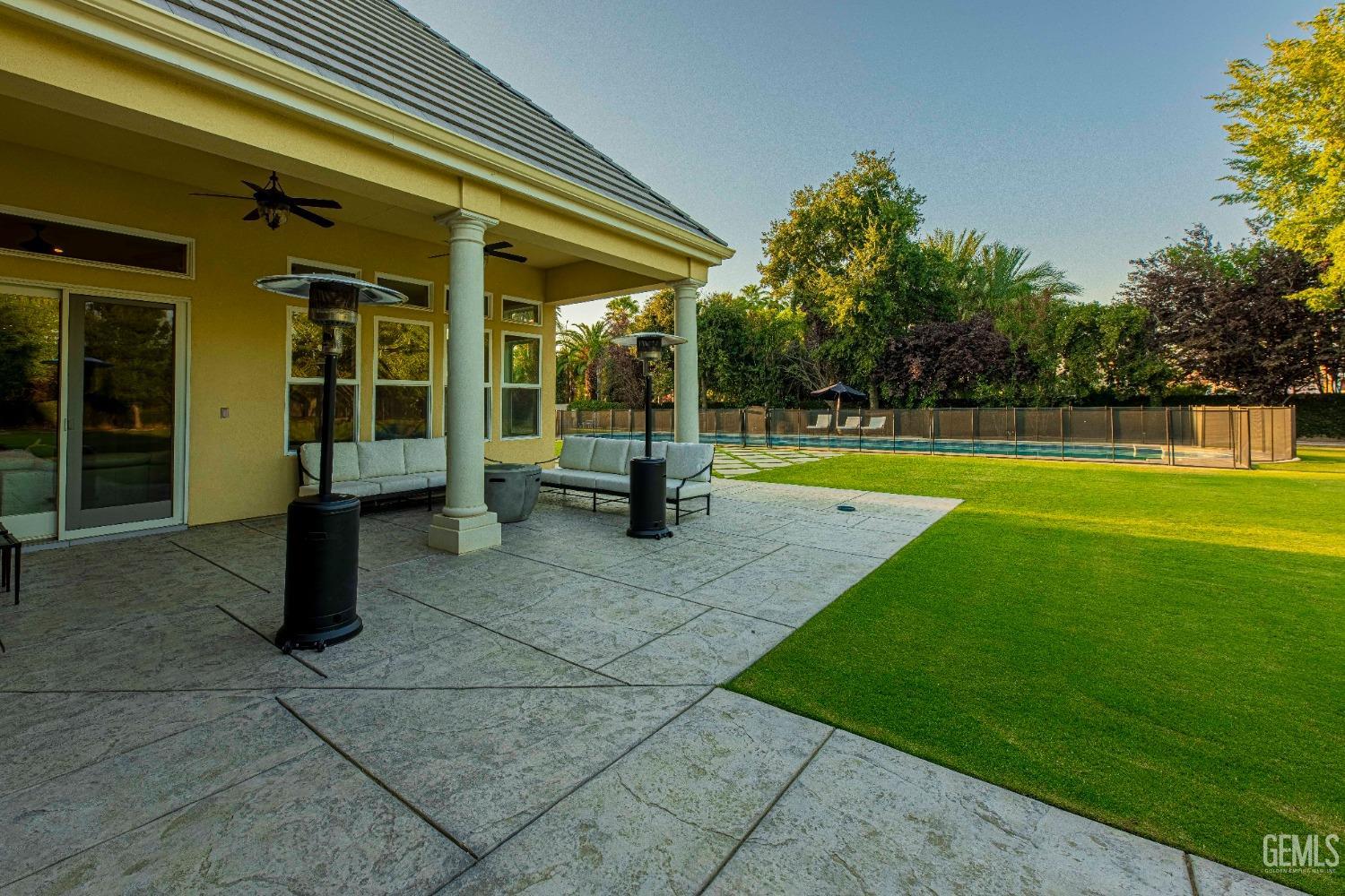 Undisclosed Address Bakersfield, CA 93314 - Photo 55 of 75 a view of a house with a backyard