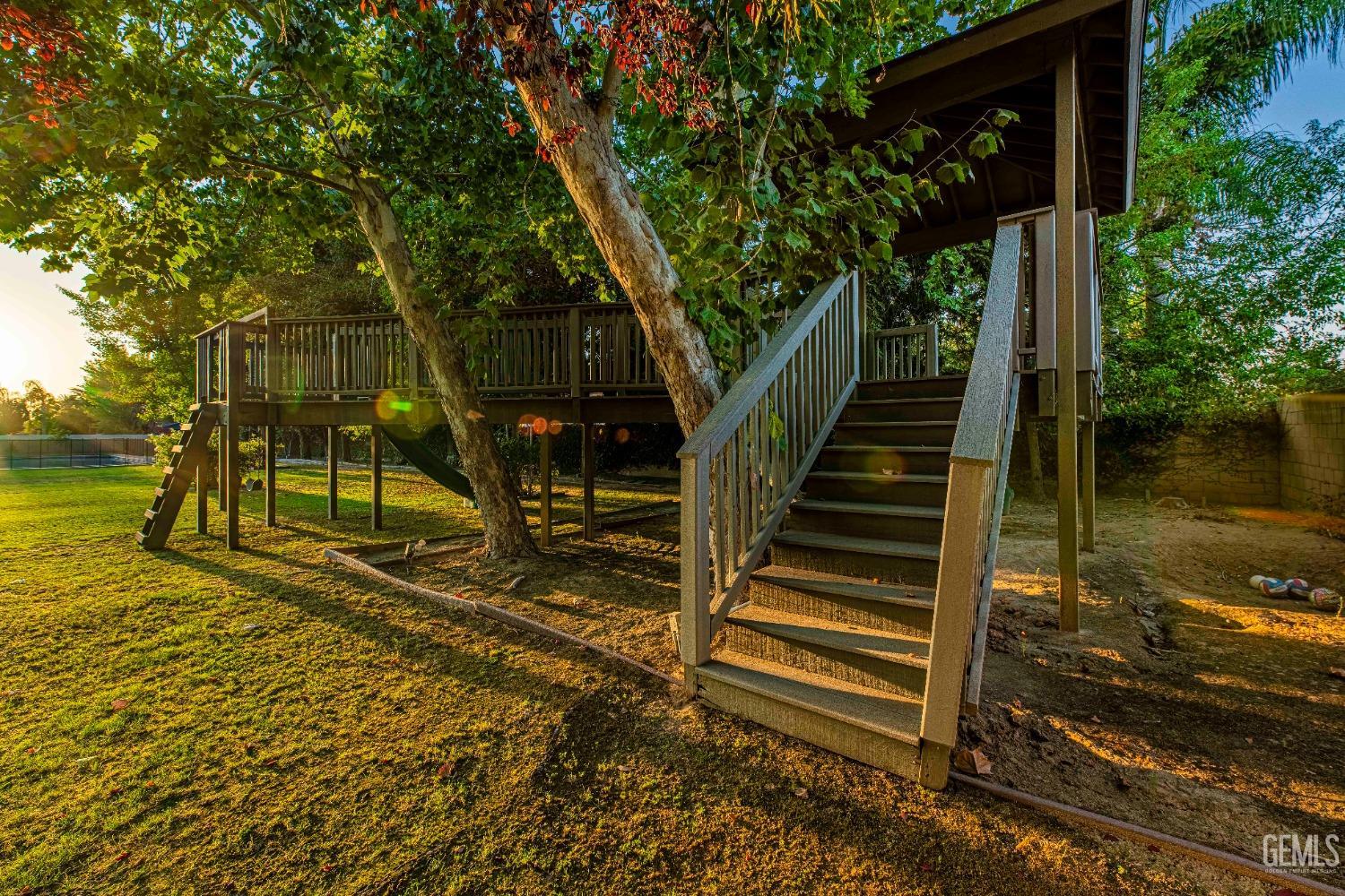 Undisclosed Address Bakersfield, CA 93314 - Photo 67 of 75 a view of a pathway of a house with a yard