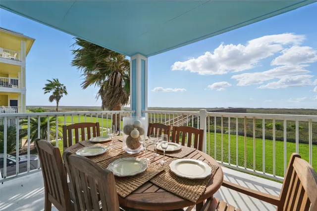 a view of a city from a dining room with furniture window and outside view