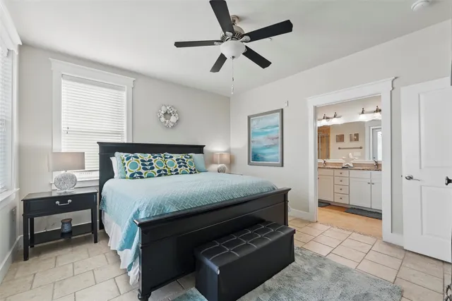 a bedroom with a bed and a table