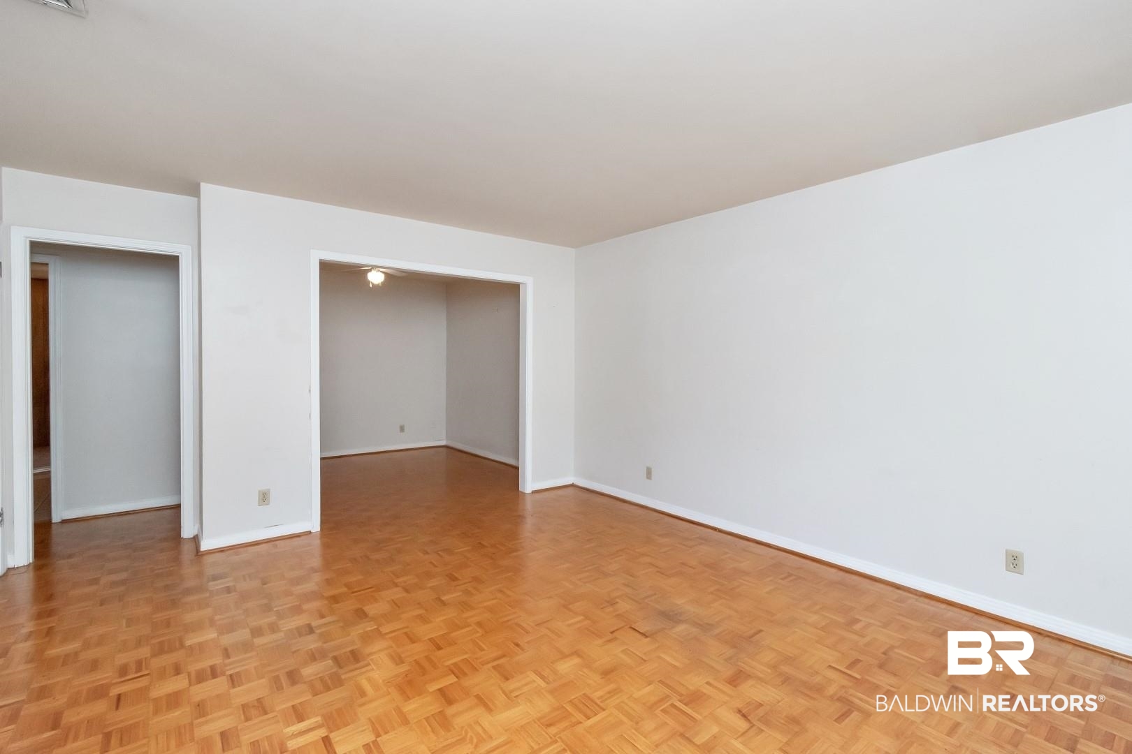 5517 Vanderbilt Drive Mobile, AL 36608 - Photo 5 of 33 Empty room with light parquet flooring