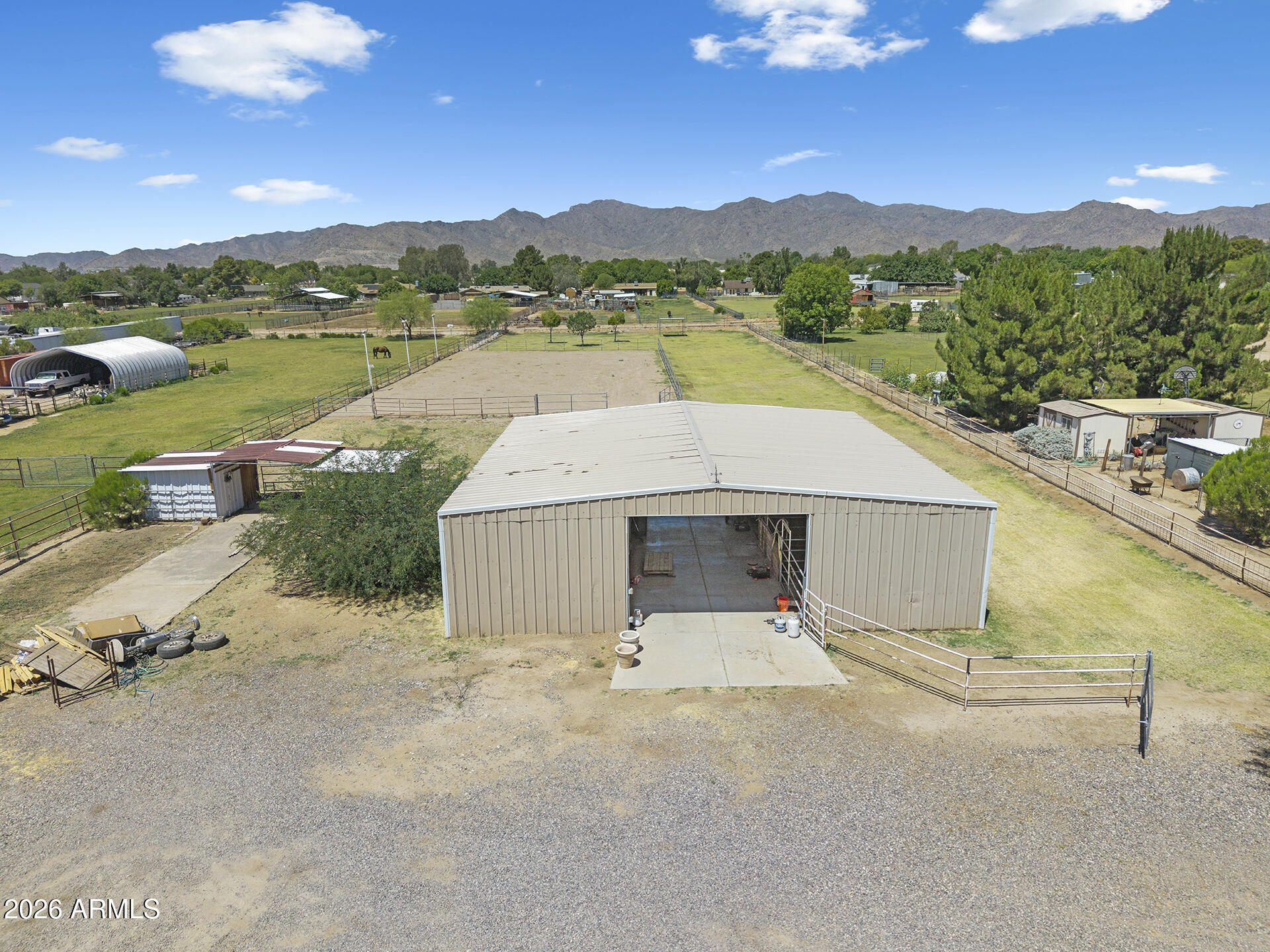 7624 North Citrus Road Waddell, AZ 85355 - Photo 52 of 57 a view of a terrace with a garden and mountain view