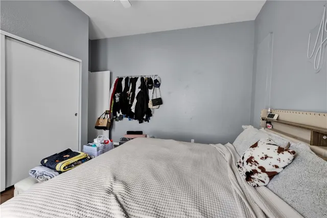 a bathroom with a sink a toilet and shower curtain