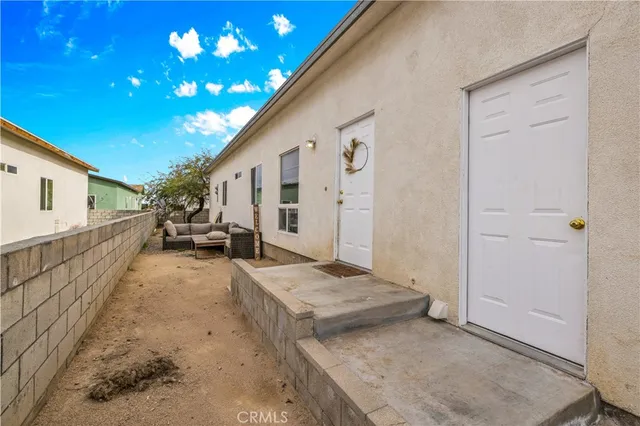 a view of backyard with green space