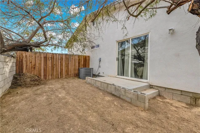 en living room with furniture and a flat screen tv