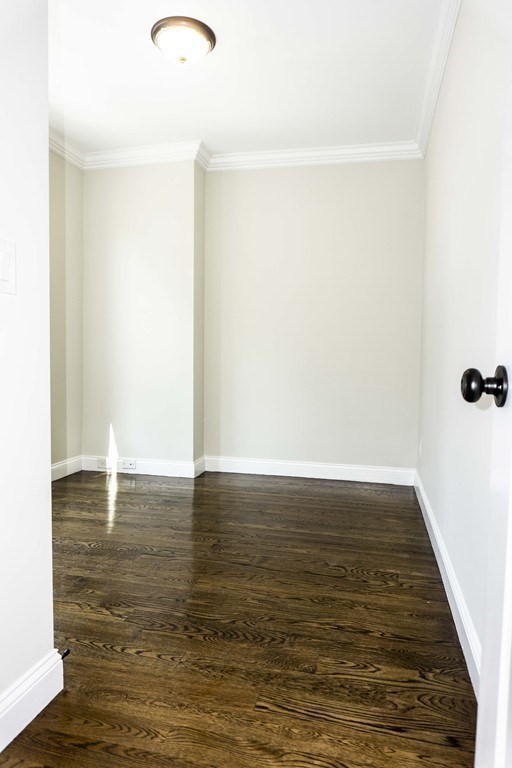 41 West Walnut Park Boston, MA 02119 - Photo 17 of 30 a view of room with wooden floor