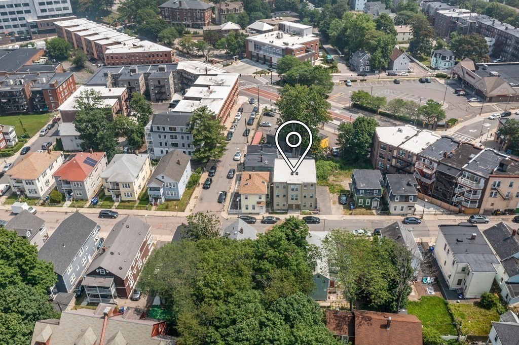 41 West Walnut Park Boston, MA 02119 - Photo 28 of 30 an aerial view of residential house with outdoor space and parking
