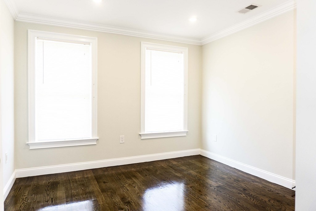 41 West Walnut Park Boston, MA 02119 - Photo 10 of 30 a view of an empty room and window