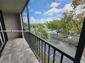a view of balcony with furniture