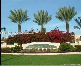 a view of a house with a garden