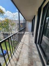 8520 Southwest 133rd Avenue Road, Unit 408 Miami, FL 33183 - Photo 6 of 10 a view of balcony with floor