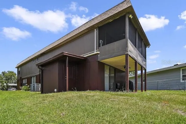a backyard of a house with lots of green space