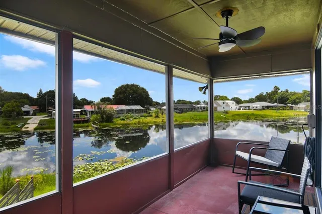 a view of a back yard from a balcony