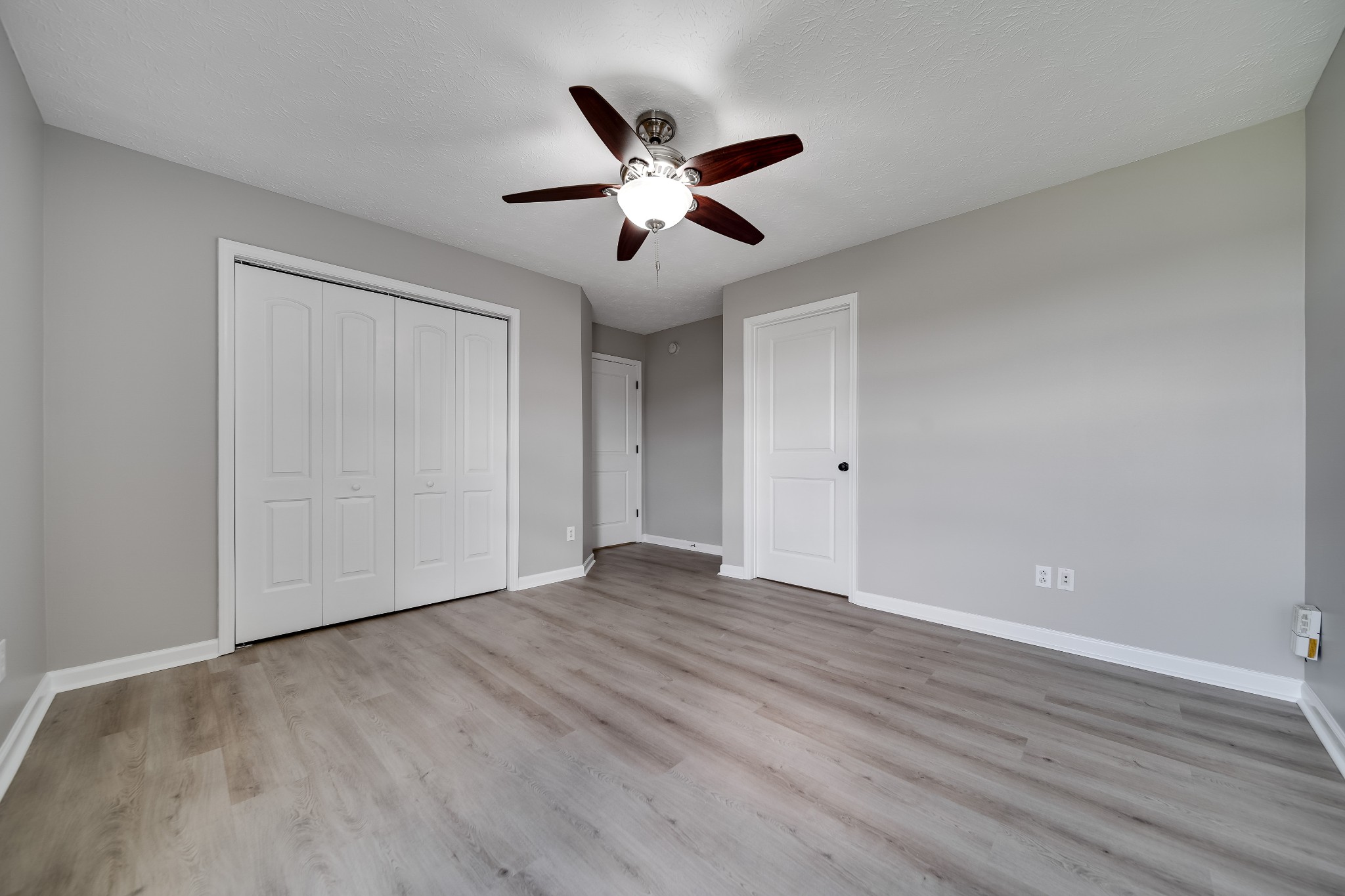 630 Berry Circle Springfield, TN 37172 - Photo 22 of 46 a view of an empty room with wooden floor