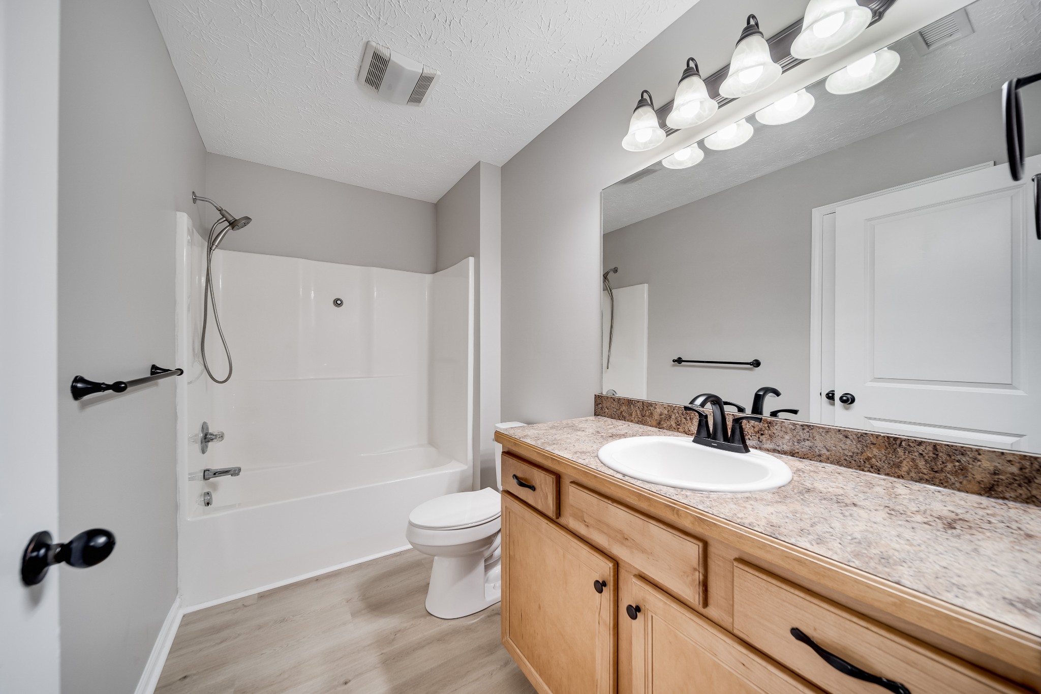 630 Berry Circle Springfield, TN 37172 - Photo 32 of 46 a bathroom with a sink a toilet and shower