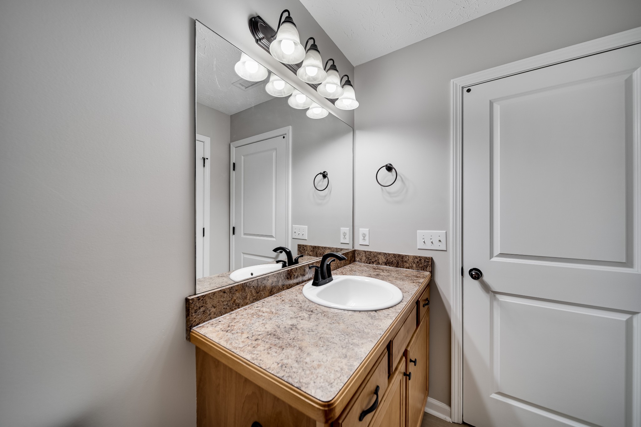 630 Berry Circle Springfield, TN 37172 - Photo 34 of 46 a bathroom with a sink vanity and a mirror