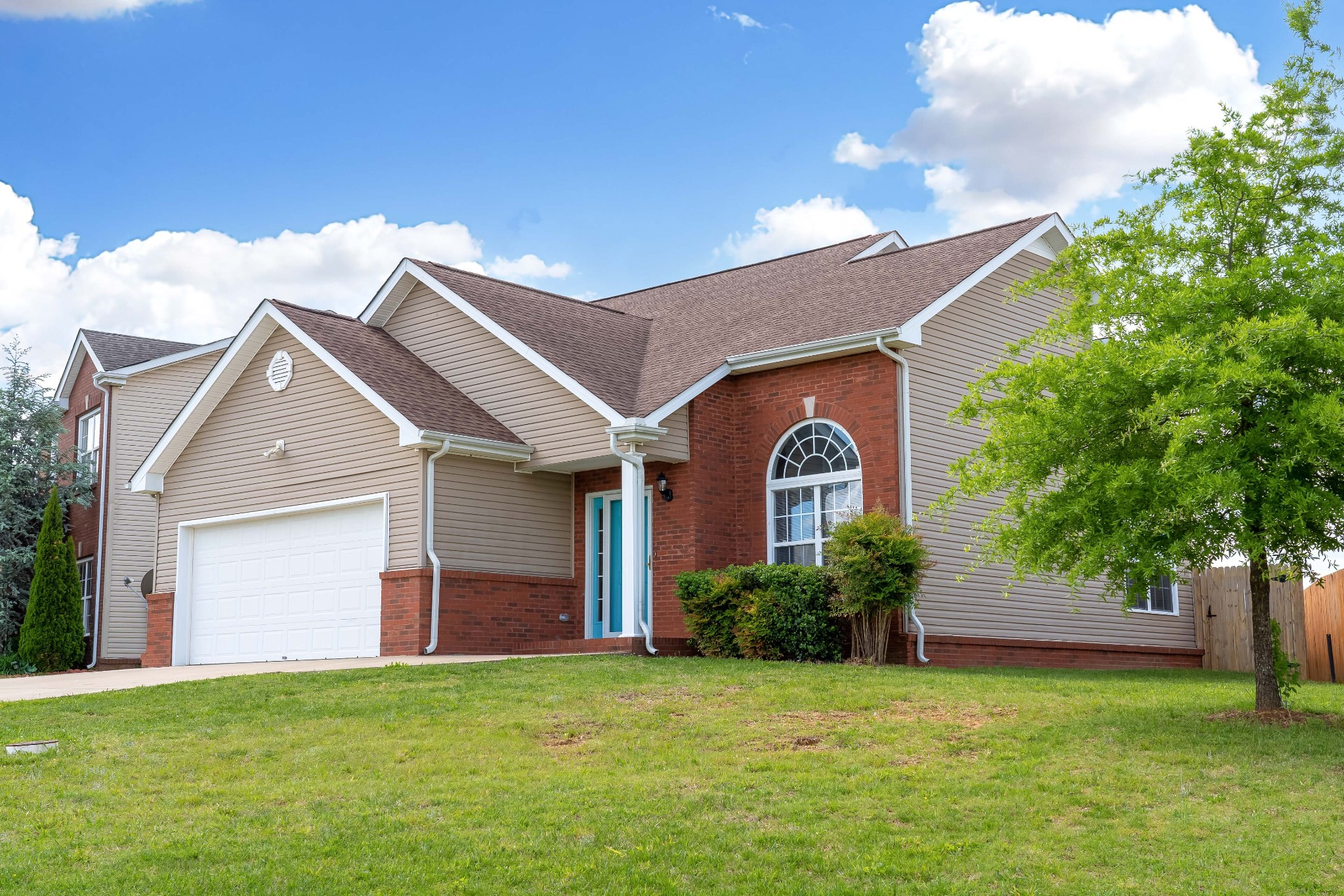 630 Berry Circle Springfield, TN 37172 - Photo 45 of 46 a front view of a house with a garden