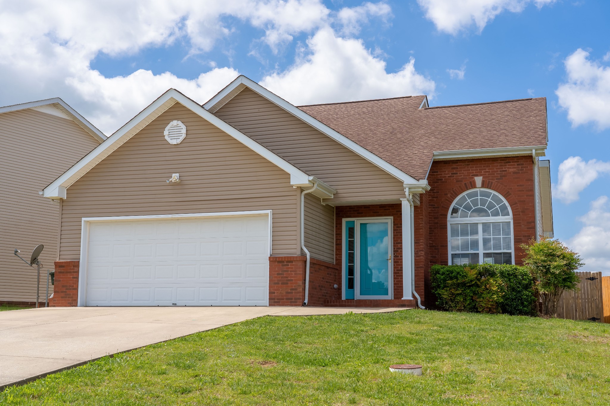 630 Berry Circle Springfield, TN 37172 - Photo 46 of 46 a front view of a house with a yard and garage
