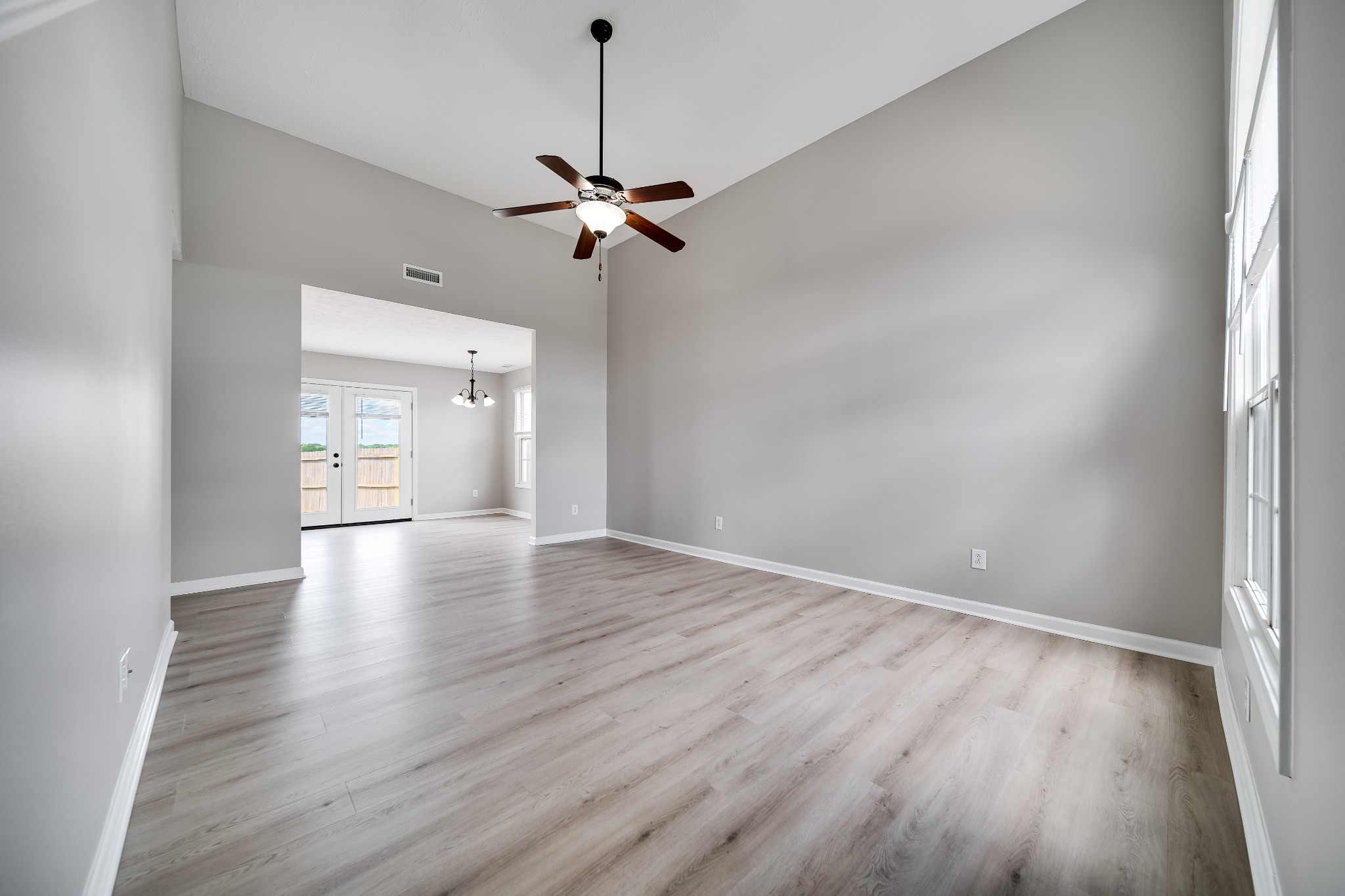 630 Berry Circle Springfield, TN 37172 - Photo 5 of 46 a view of empty room with wooden floor and ceiling fan