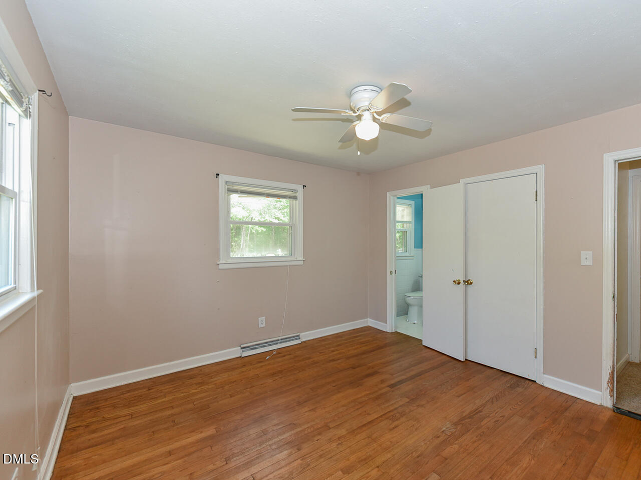 1703 St Patrick Drive Raleigh, NC 27603 - Photo 14 of 29 a view of a big room with wooden floor and windows in a room
