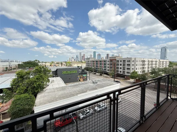 a view of a city from a balcony