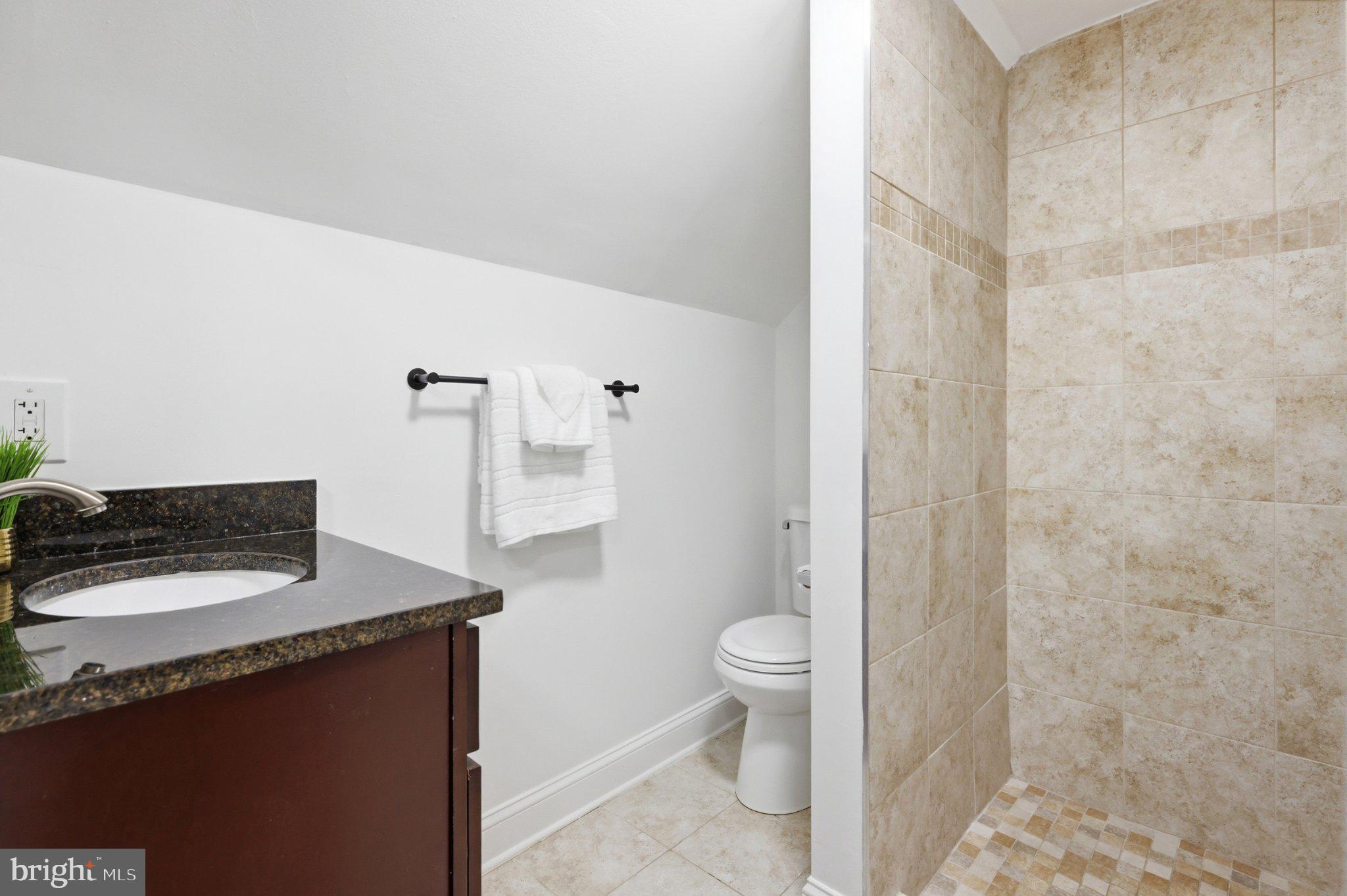 10419 Grandin Road Silver Spring, MD 20902 - Photo 28 of 44 Charming bathroom with modern finishes.