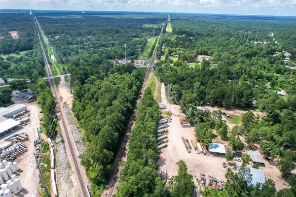 a view of a garden with an outdoor space