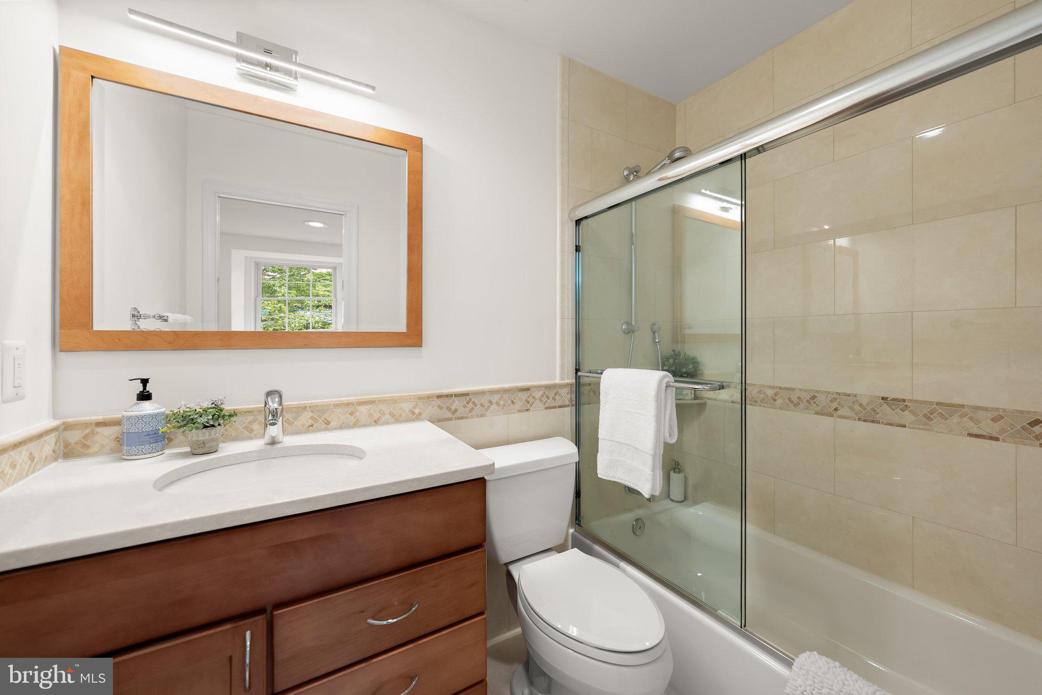 3229 Sutton Place Northwest, Unit B Washington, DC 20016 - Photo 16 of 24 En suite Full Bathroom with bathtub