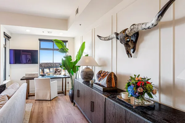 a kitchen with stainless steel appliances a sink and a refrigerator