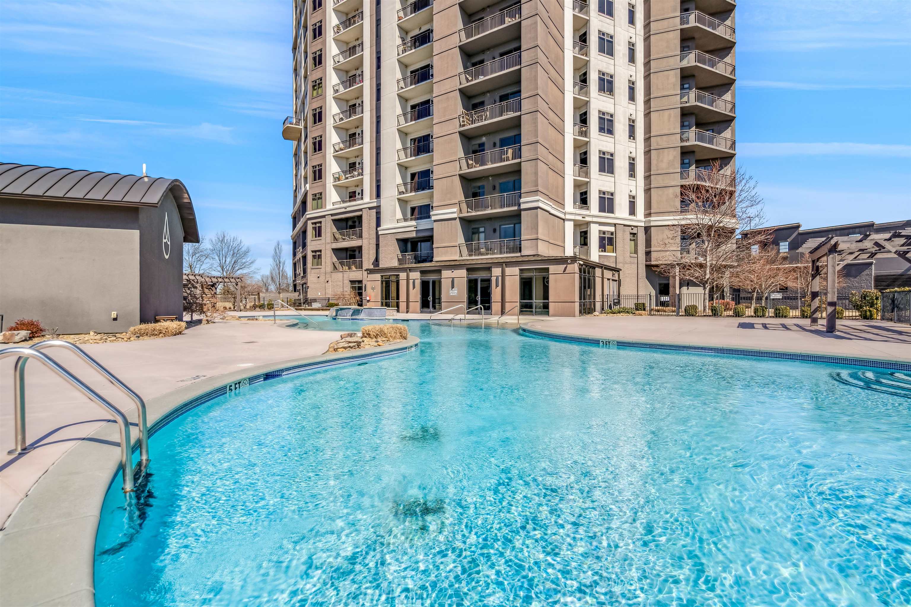717 Riverside Drive, Unit 1205 Memphis, TN 38103 - Photo 15 of 33 Community pool with a patio area