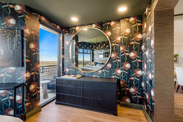 a view of living room with furniture and a window