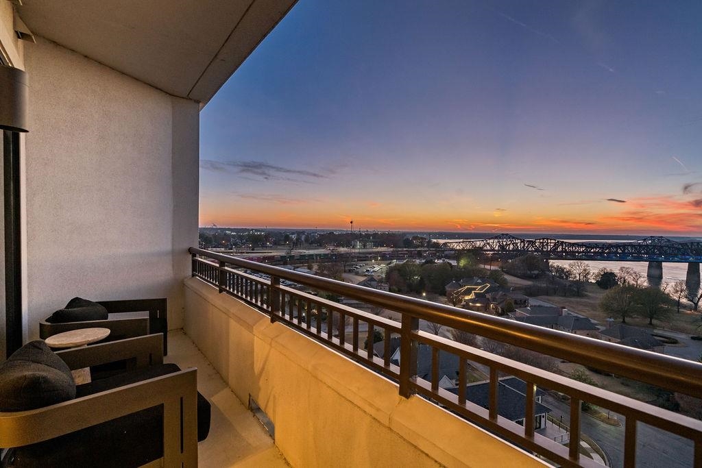 717 Riverside Drive, Unit 1205 Memphis, TN 38103 - Photo 18 of 33 View of balcony at dusk