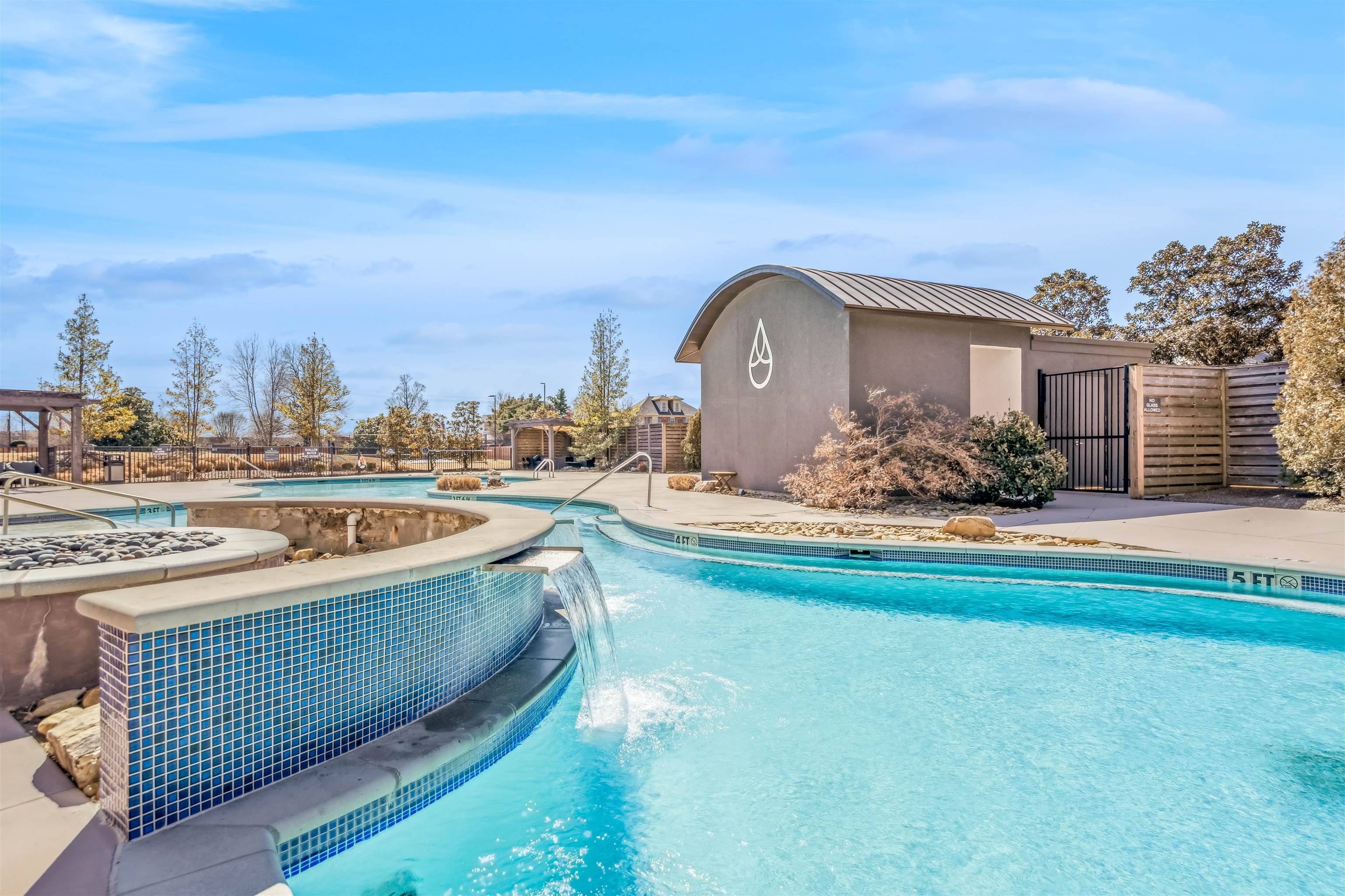 717 Riverside Drive, Unit 1205 Memphis, TN 38103 - Photo 25 of 32 Community pool featuring a patio, a gate, and a jacuzzi
